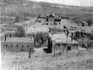 The plaza of Abiquiu, 1920. Spanish Governor Cachupin, issued a land grant to genizaros and others in the Abiquiu region around 1754. The  northern New Mexico Spanish word does not originate from an indigenous culture in New Mexico or the New World. In fact the origins of genizaro can be traced to Turkey in the Middle East.